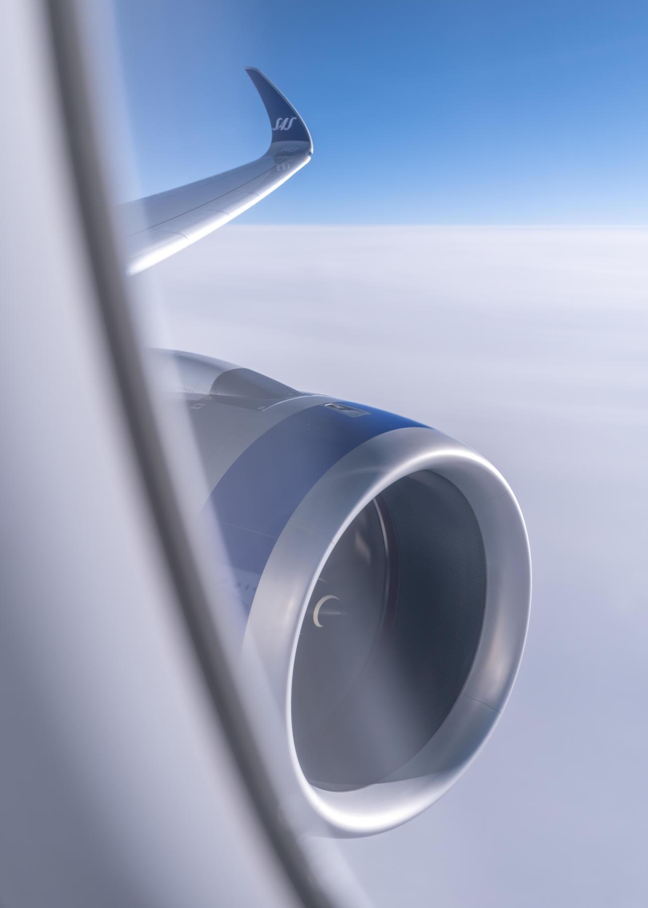 从飞机窗口眺望飞过云层的美丽一天