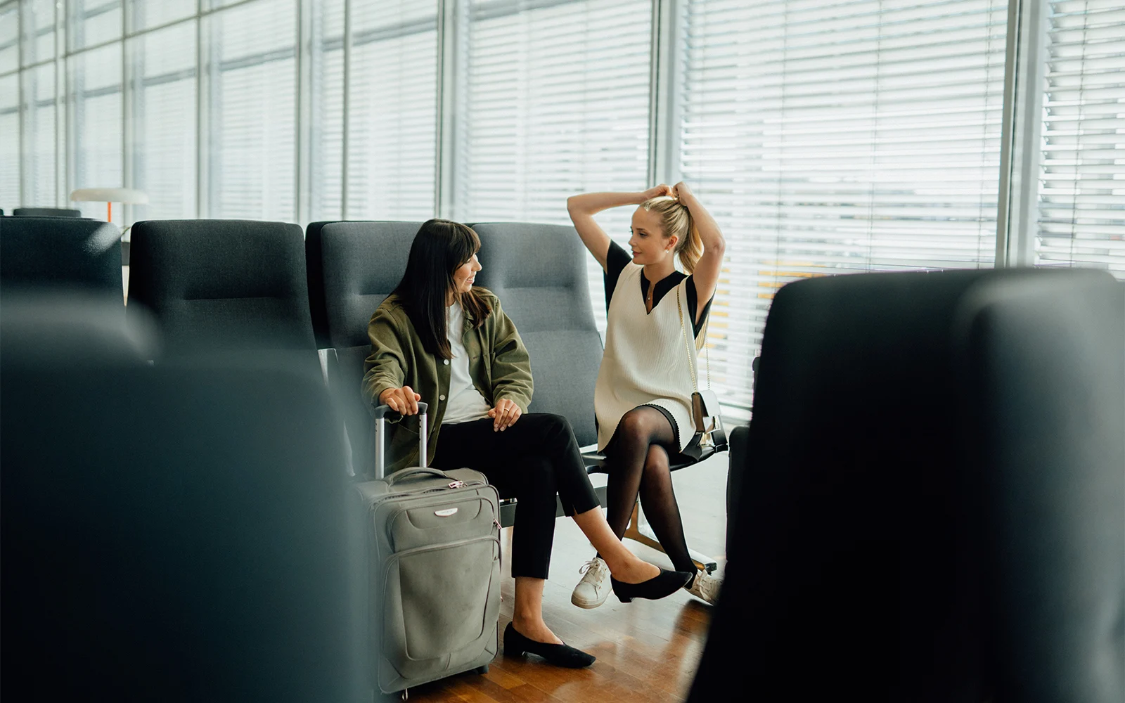 Women waiting at the boarding gate